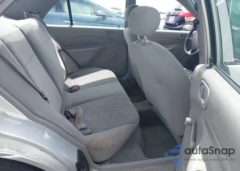 1999 Ford Escort Lx z USA, uszkodzony, nr VIN 1FAFP10P6XW164410